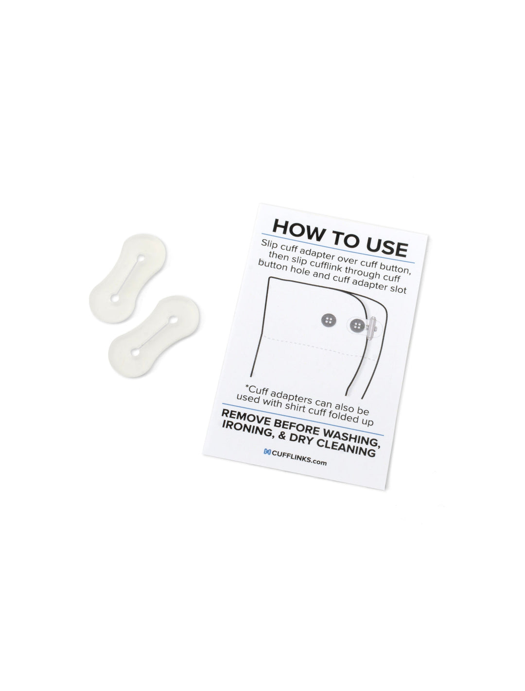 Two small, clear silicone Cufflink Adapters next to an instruction card illustrating how to attach them to a dress shirt.