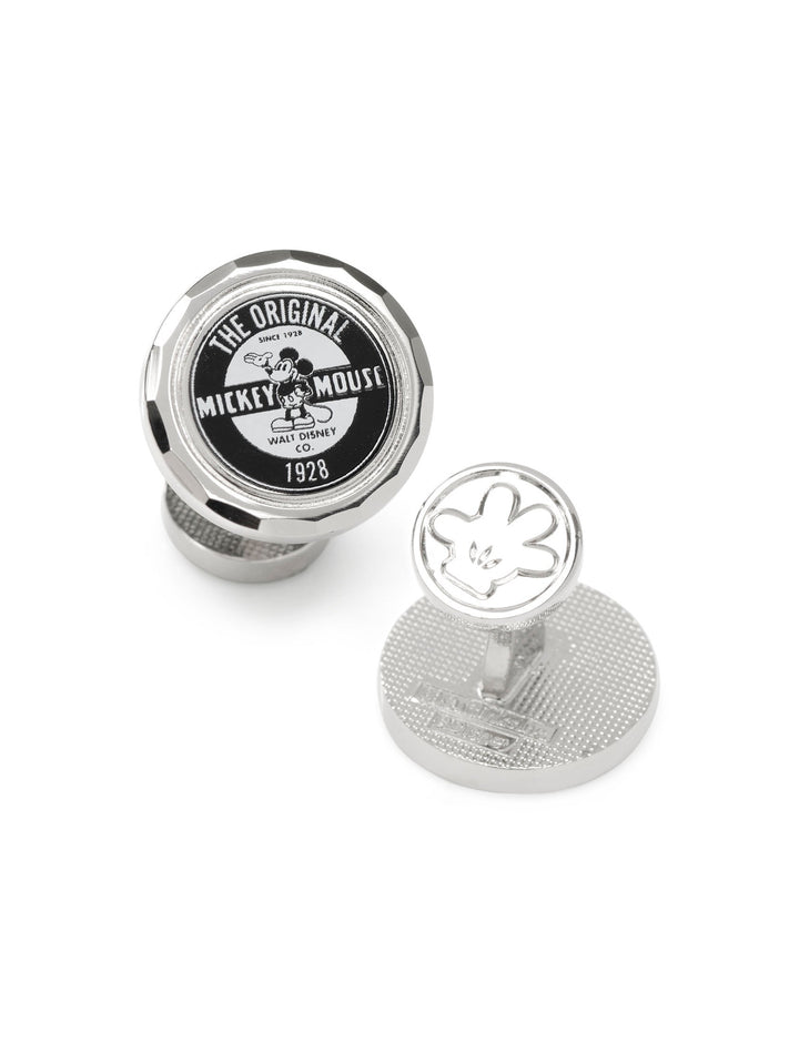 Disney Mickey Mouse Original Cufflinks featuring one circular black-and-white emblem with “The Original Mickey Mouse 1928” text and one circular cufflink with an embossed white glove.