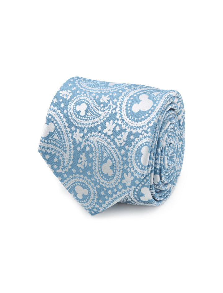 A rolled Disney Mickey Mouse Teal Paisley Men’s Tie in teal silk featuring a white paisley pattern with Mickey Mouse silhouettes.
