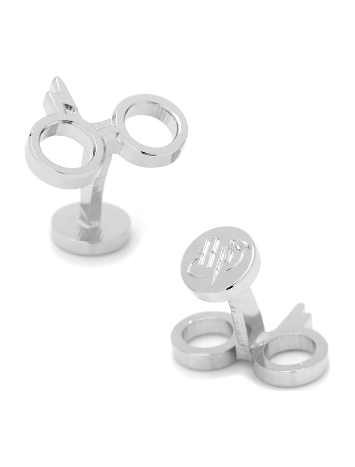 Harry Potter Glasses Cufflinks made of silver-plated metal, shaped like round glasses with a small lightning bolt and circular backings engraved with the initials HP.