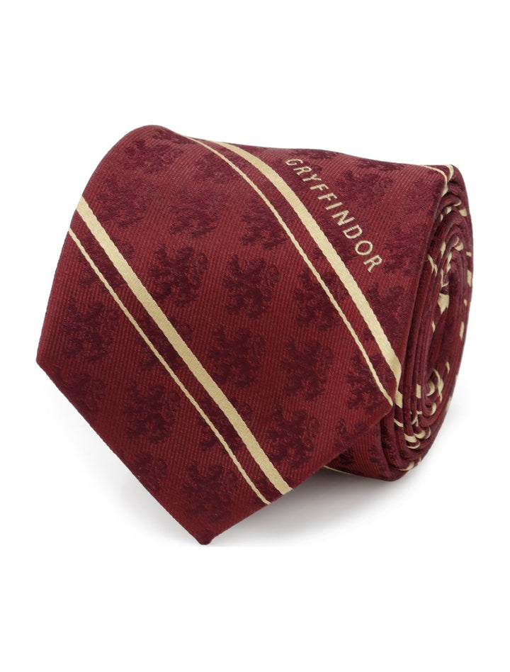 Harry Potter Gryffindor Maroon Stripe Silk Men’s Tie in maroon with yellow stripes, a repeated lion emblem, and the word “GRYFFINDOR” printed diagonally.