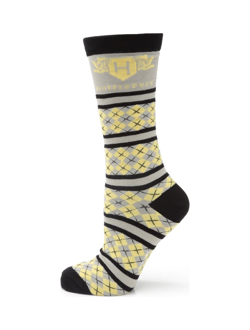 Harry Potter Hufflepuff Men’s Sock in yellow, gray, and black, featuring a yellow crest logo at the cuff, an argyle pattern on the foot, and horizontal stripes on the leg.