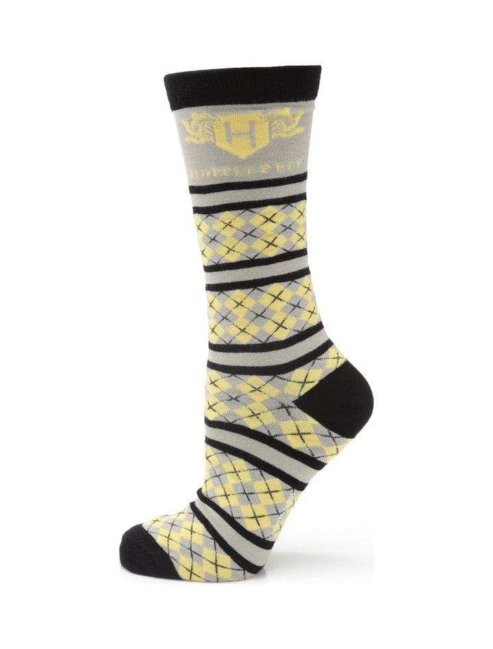 Harry Potter Hufflepuff Men’s Sock in yellow, gray, and black, featuring a yellow crest logo at the cuff, an argyle pattern on the foot, and horizontal stripes on the leg.
