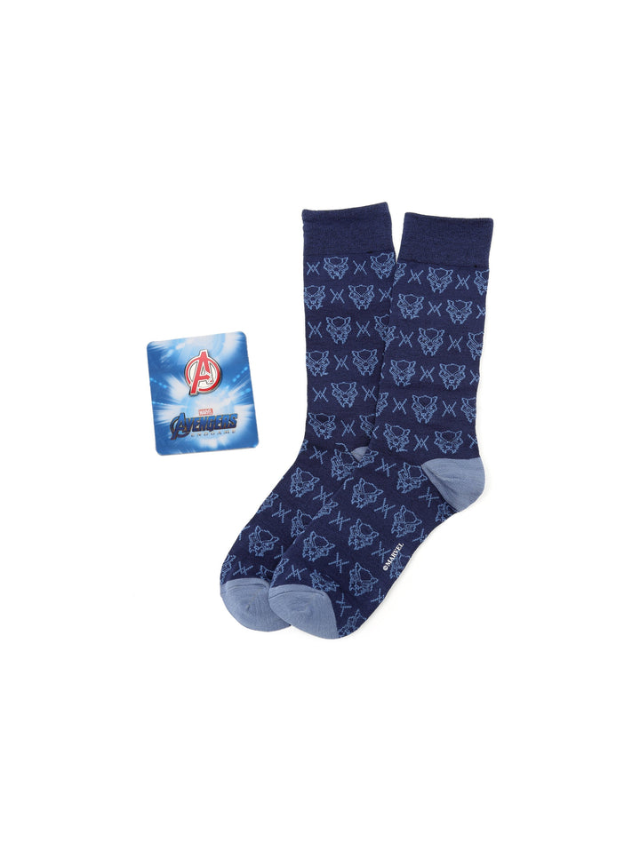 A pair of navy blue Black Panther socks with a repeating mask pattern from the Marvel Avengers Black Panther Blue Gift Set, presented with a square gift tag.