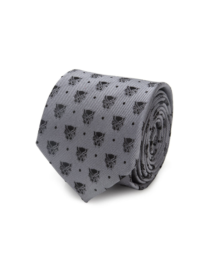 A rolled-up gray silk Marvel Black Panther Gray Dot Tie featuring a repeating pattern of black panther masks and small dots.