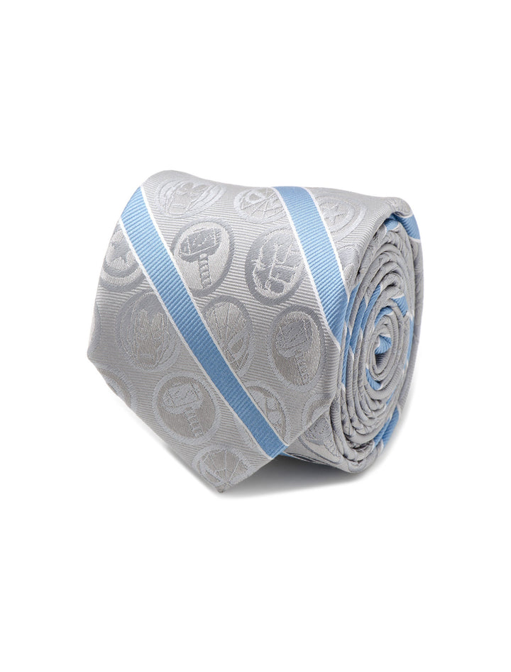 A rolled Marvel Comics Gray and Blue Stripe Men’s Tie in gray silk with blue diagonal stripes and circular superhero icons.