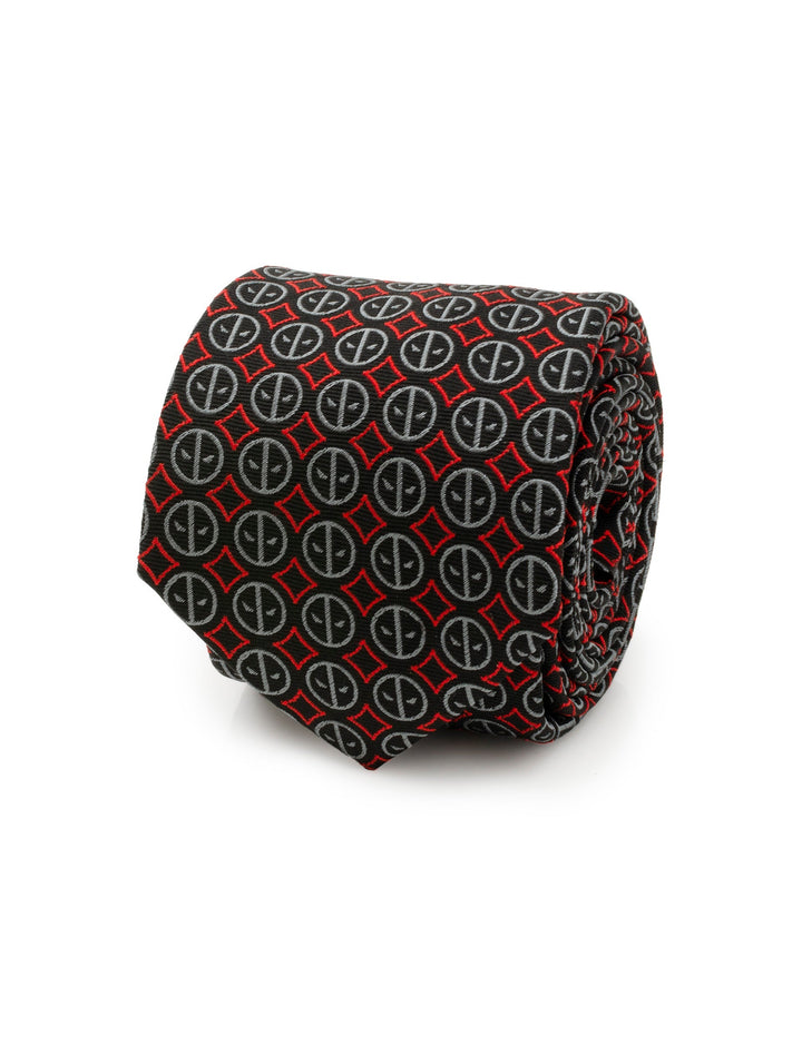 A rolled Marvel Deadpool Men’s Black Tie featuring a repeating red and grey Deadpool logo pattern.