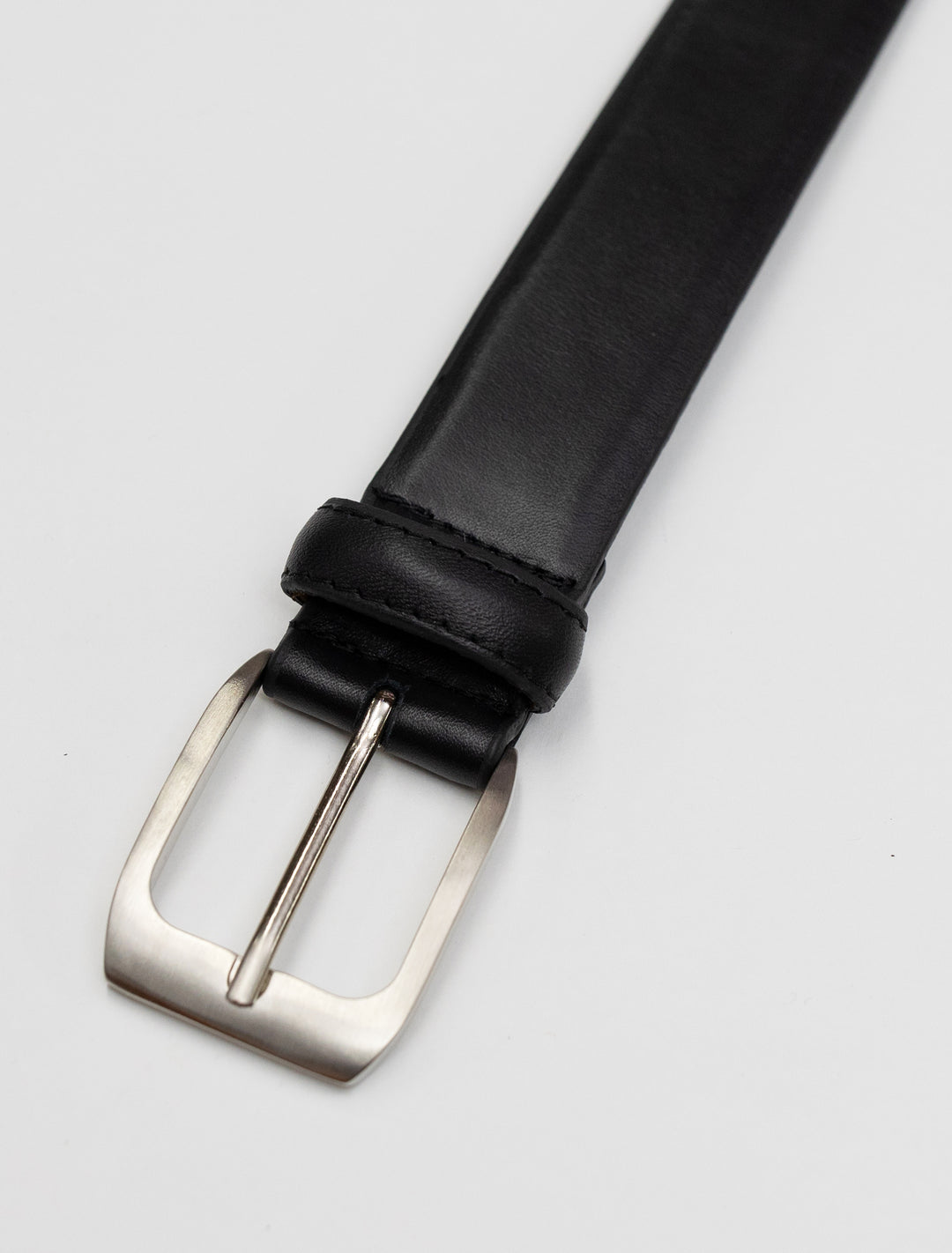 A Black Waved Leather Frame Buckle Belt by Florsheim with a silver buckle available in various waist sizes.