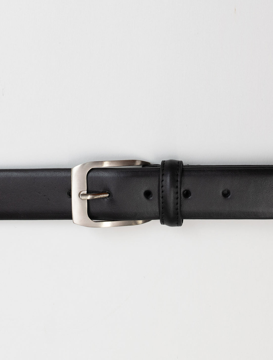 A Black Waved Leather Frame Buckle Belt by Florsheim with a buckle on a white background.