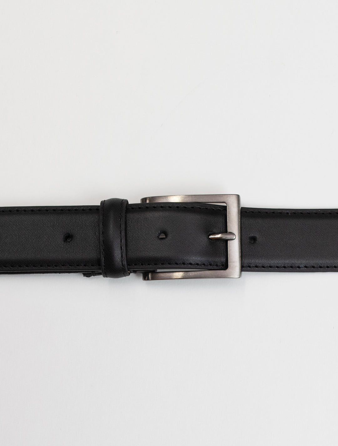 A stylish Black Stitch Edge Leather Frame Buckle Belt by Florsheim with a genuine leather strap and a sleek buckle design, showcased on a clean white background.
