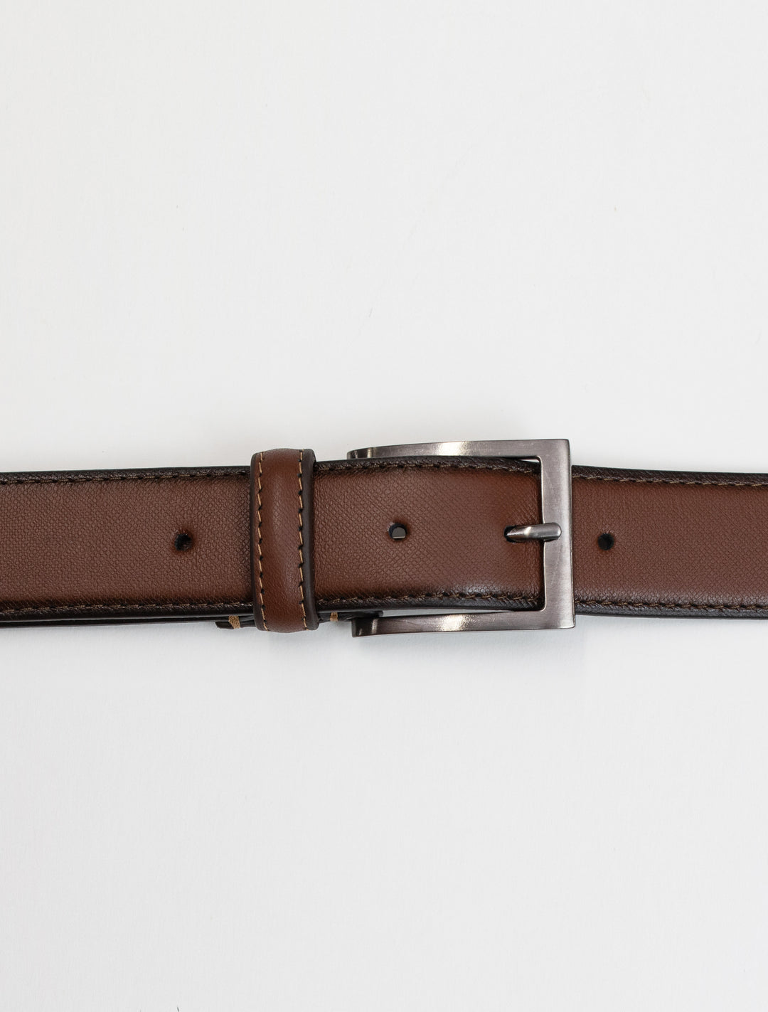 A stylish Cognac Stitch Edge Leather Frame Buckle Belt by Florsheim, featuring a genuine leather strap and a sleek buckle, placed on a white background.