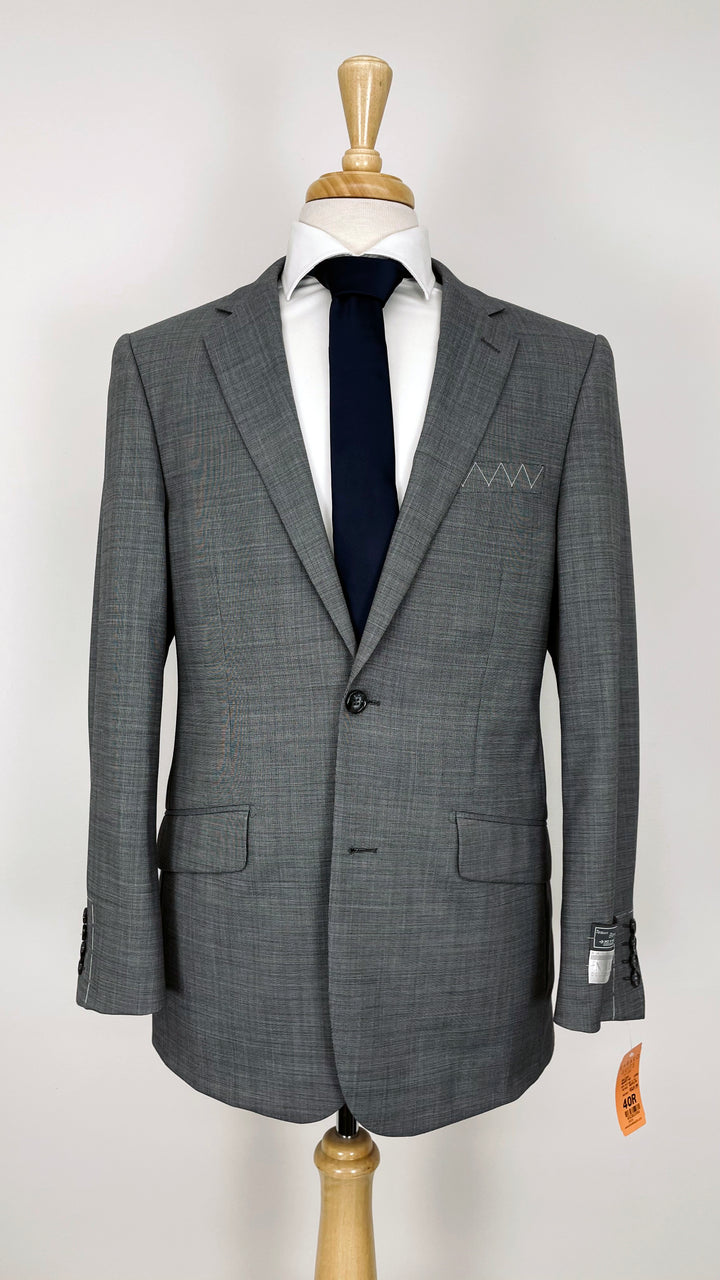 A grey suit on a Karako Collecti mannequin dummy.