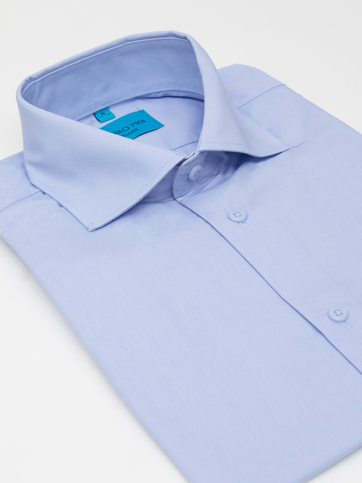 A Karako Men Light Blue Dress Shirt on a white surface.